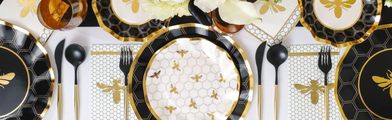 A plate decorated with bees, accompanied by close-up views of brushes and honeycomb, suitable for party and event settings.