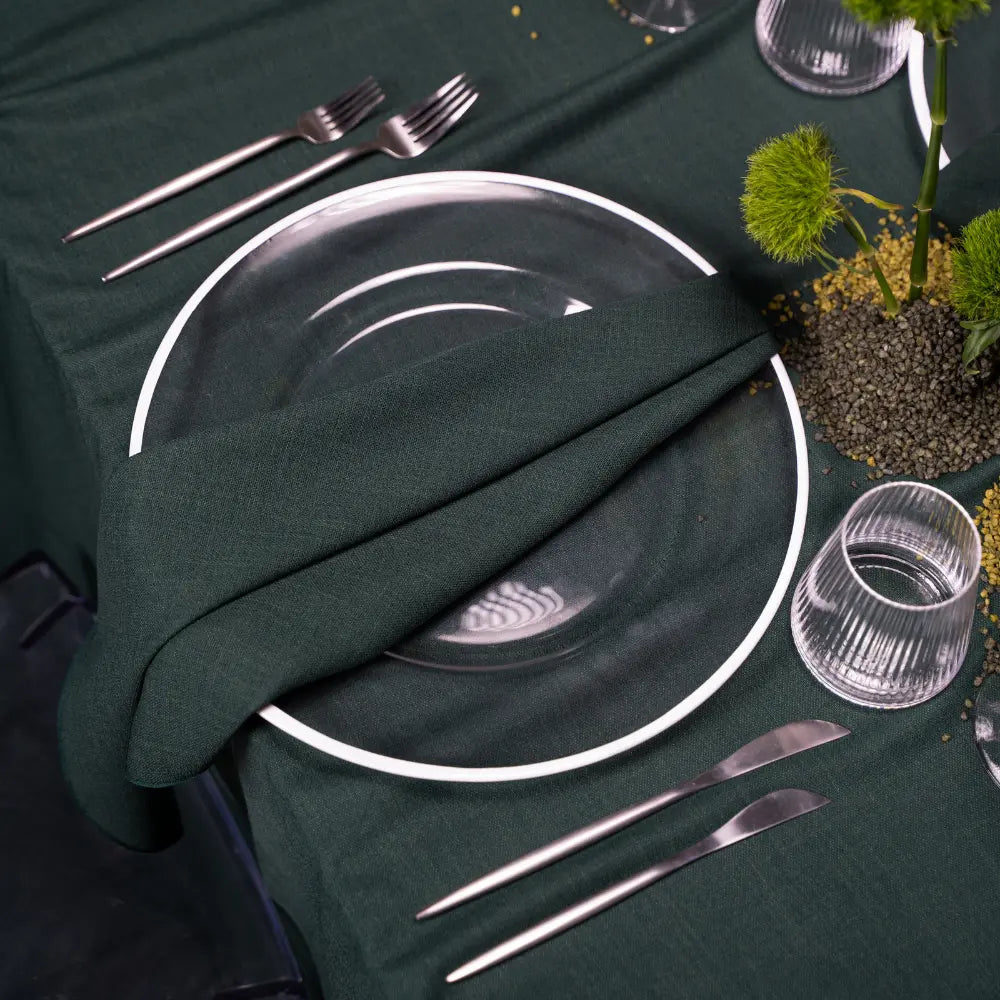 CHARGER PLATE - CLEAR W/ WHITE RIM showcased in an elegant table setting with matching linen, cutlery, and decorative flowers, perfect for sophisticated dining occasions.