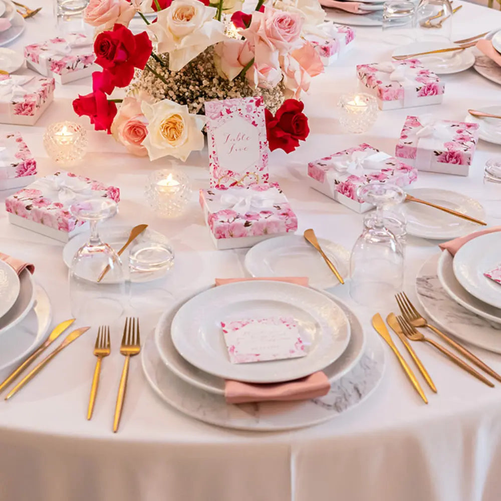 Charger Plate - Marble Tray elegantly set on a wedding table with porcelain plates, blush napkins, gold flatware, and floral decor. Perfect for sophisticated events.