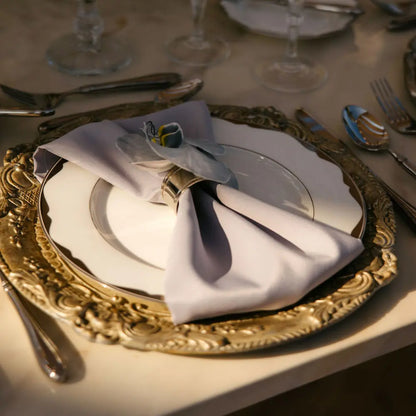 CHARGER PLATE - FLORENTINE ANTIQUE WOOD at an elegant dinner setting with silverware, showcasing its handcrafted Italian design ideal for luxurious events.