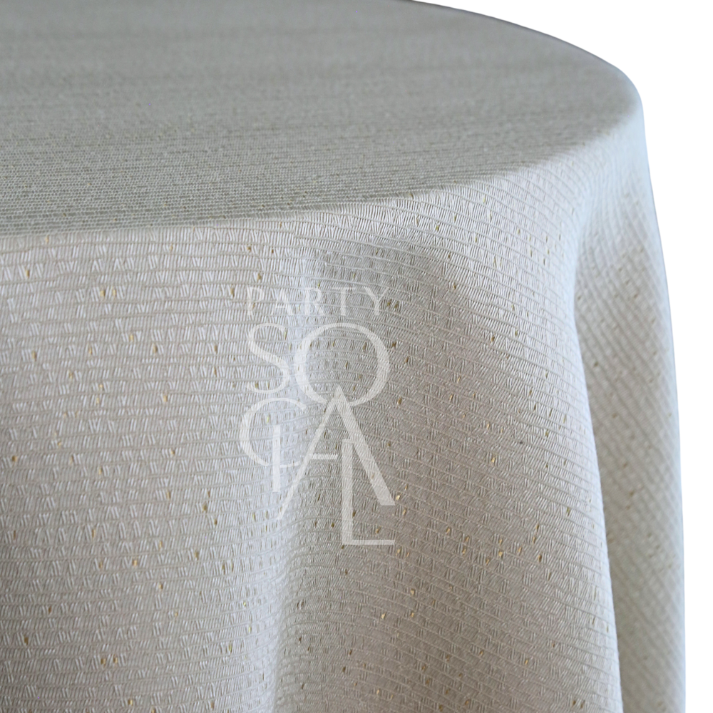 TEXTURED IVORY FABRIC WITH GOLD SPECS on a table, featuring a geometric weave and subtle gold flecks, ideal for enhancing event decor.