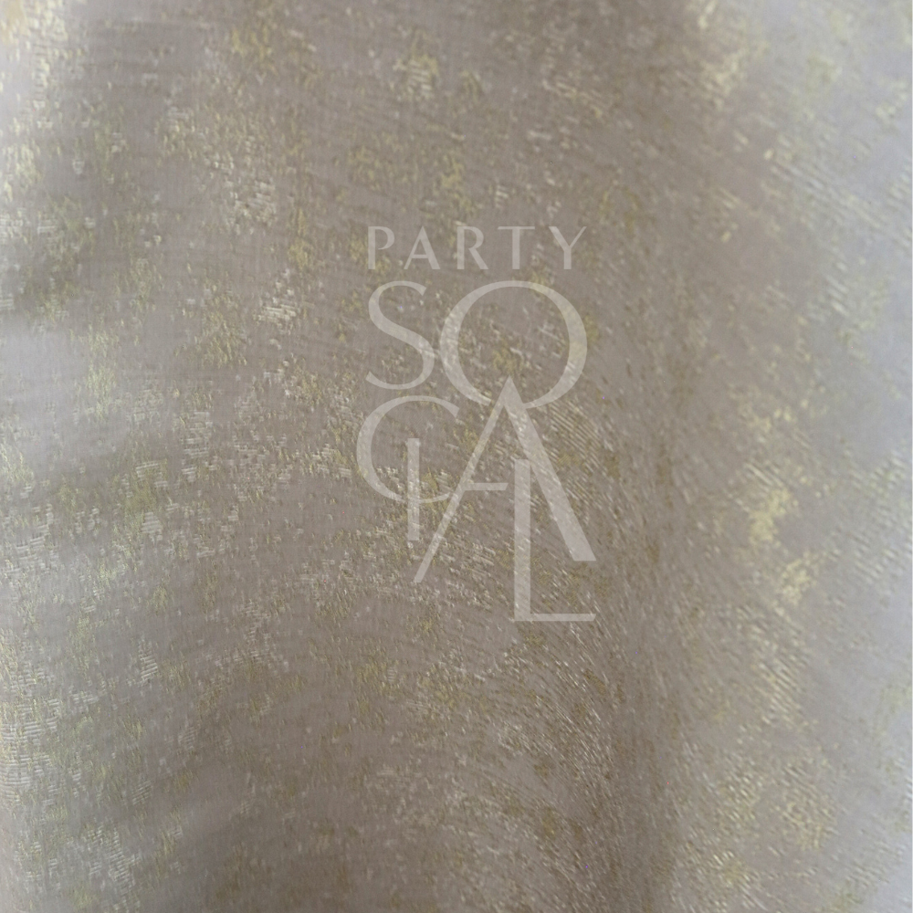 Close-up of the GOLD SHIMMERING IN GREY TABLE CLOTH, featuring semi-sheer fabric with subtle gold flecks, perfect for elegant events at Party Social.