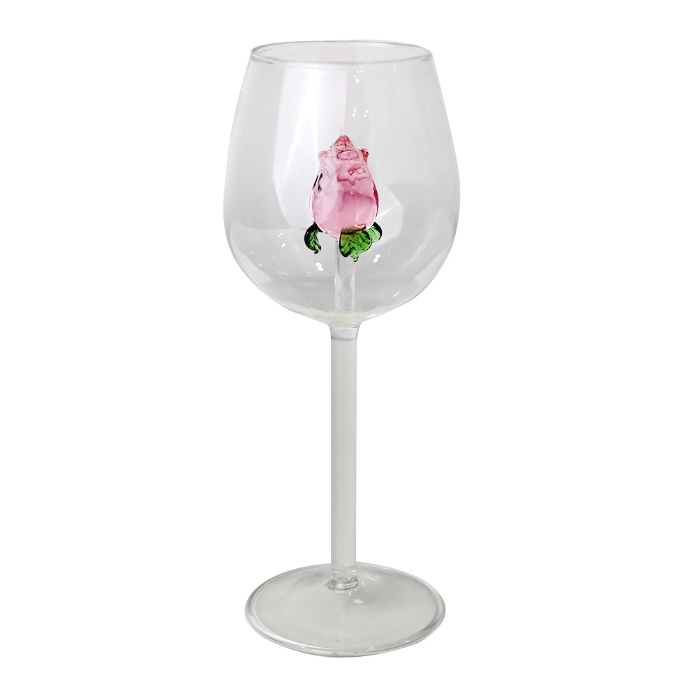 Clear glass wine glass with a rose charm.
