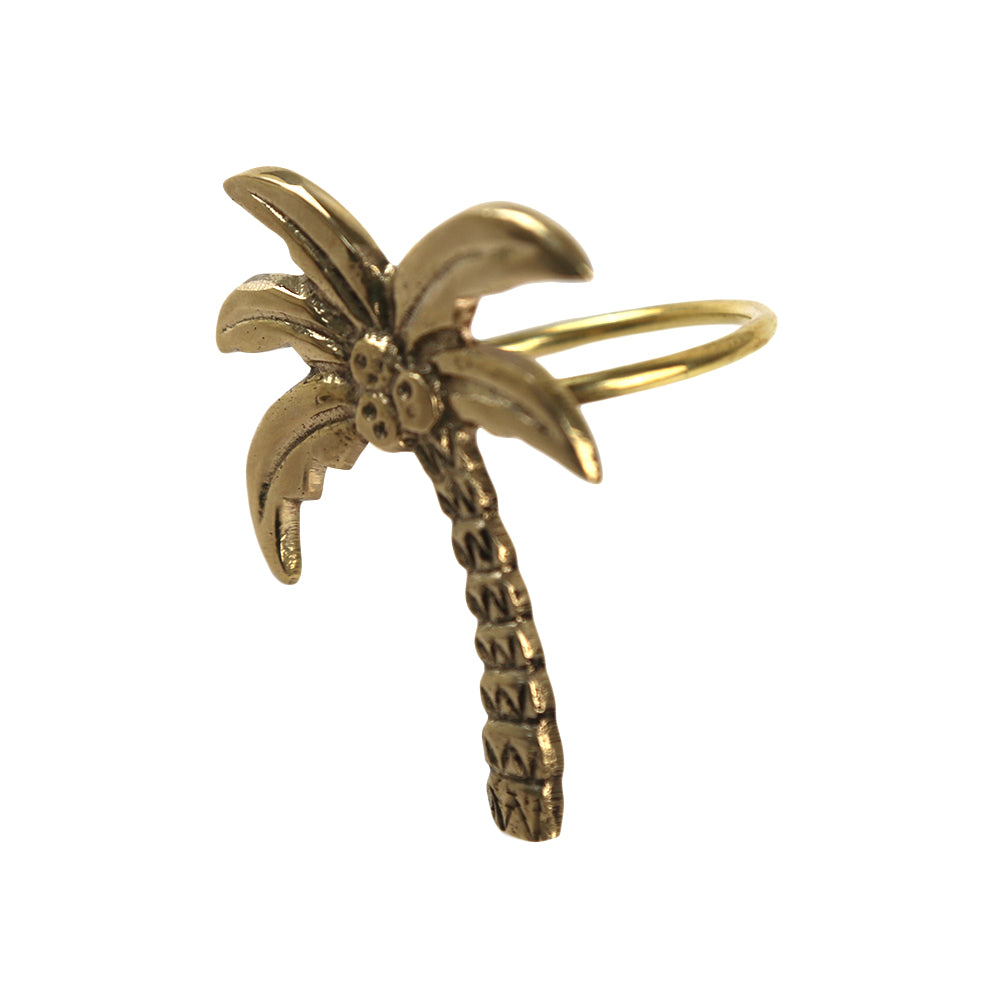 A stylish brass palm tree napkin ring, perfect for enhancing your dining experience.