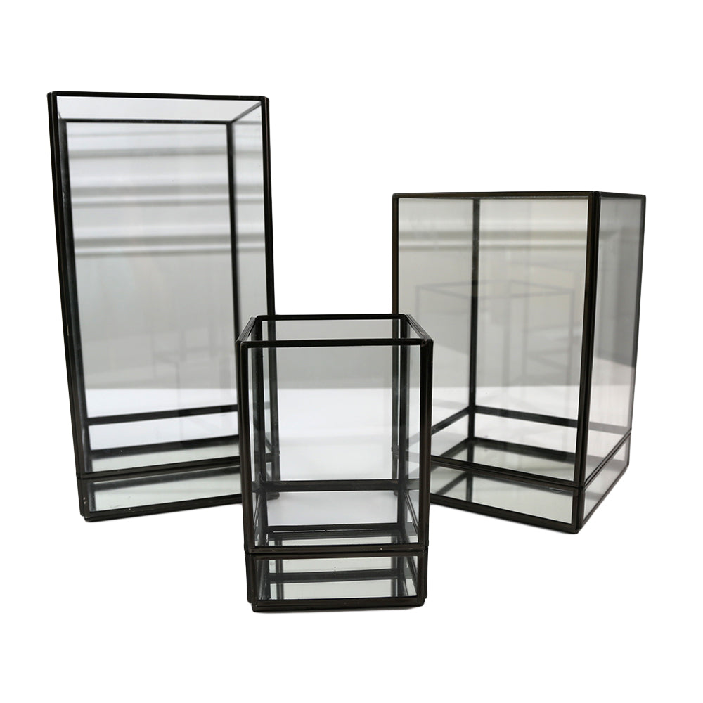 Modern Black Edge Lanterns featuring glass construction and black framing, ideal for holding flowers or candles to enhance party or event table settings.