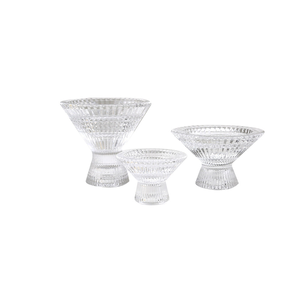 Alt text: Ruffles Glass Candle Holder, 1 Each, featuring elegant clear glass bowls, perfect for tealight and tapered candles, adding sophistication to any table setup.