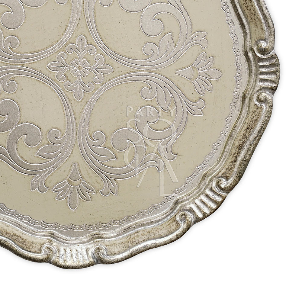 CHARGER PLATE - FLORENTINE ANTIQUE: Close-up of a handcrafted silver plate with intricate design, ideal for elegant table settings.