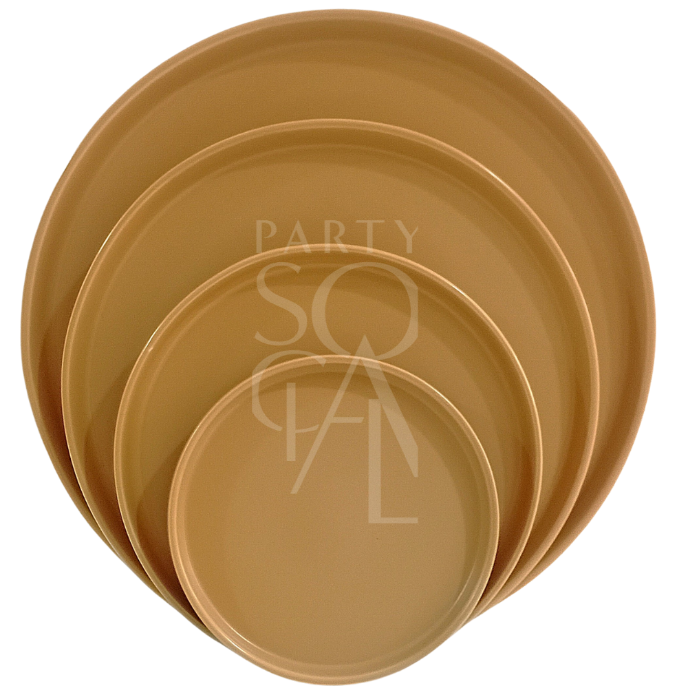 Mustard Ceramic Matte Plates: Four nested, round, shallow plates with a warm finish, perfect for modern, minimalist party settings.