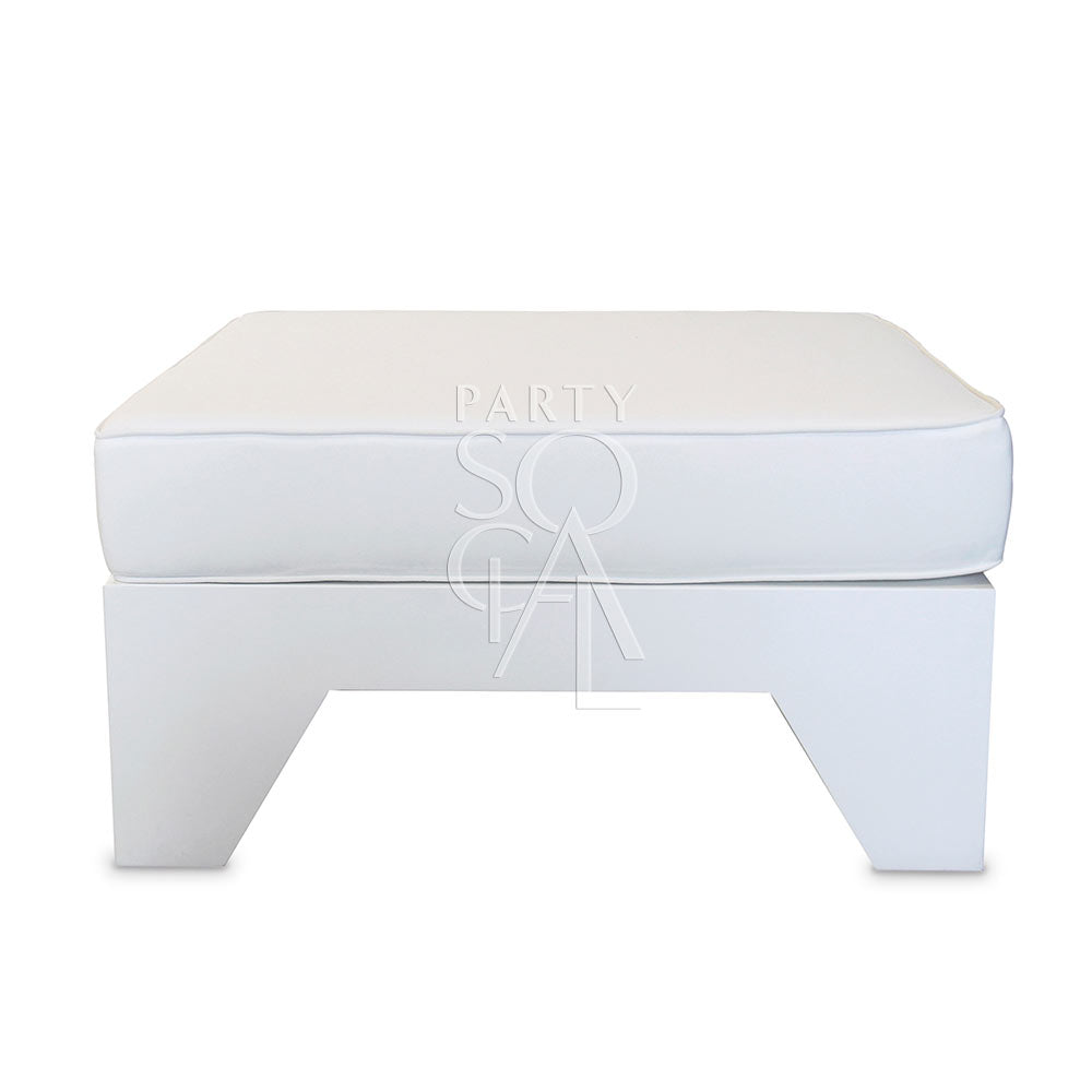 WHITE OTTOMAN SEATER: A standalone ottoman with legs, designed to complement lounge seating. Perfect for enhancing event spaces with stylish, functional furniture. Dimensions: 80cm L x 80cm W x 42cm H.