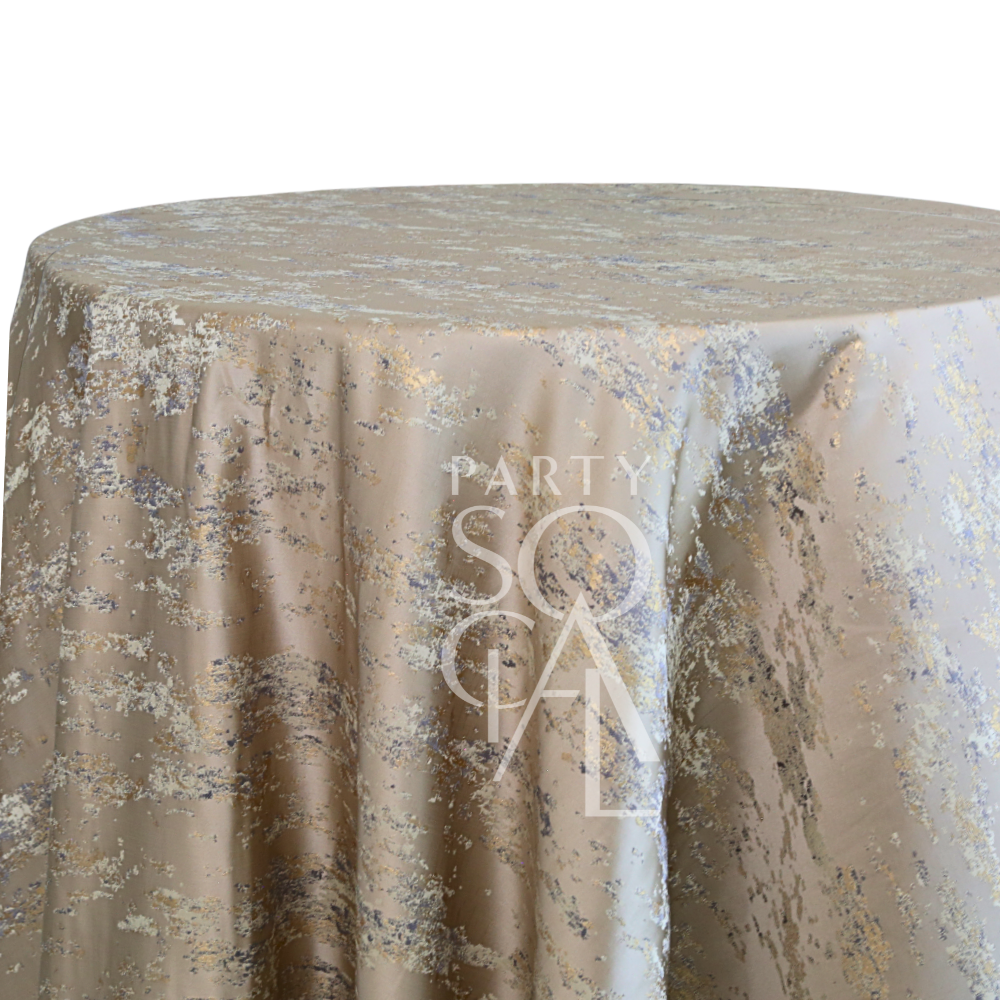 Champagne Distressed Metallic Tablecloth with silver and gold flecks, perfect for upscale events, displayed with PARTY SOCIAL text overlay.