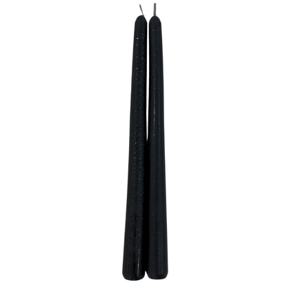 Tapered Flame Smokeless Candles: Two elegant black taper candles, unlit, crafted artisanly in Belgium, ideal for adding a warm ambience to any setting.