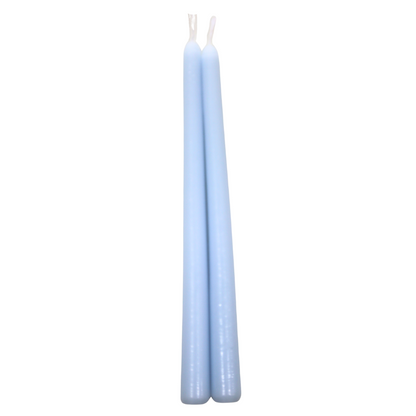 Tapered Flame Smokeless Candles, handcrafted in Belgium, stand elegantly side by side, perfect for adding a warm ambiance to any party setting.