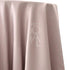 ROUND TABLECLOTH SATIN, featuring a close-up of its premium satin fabric, ideal for enhancing special occasions with elegance.