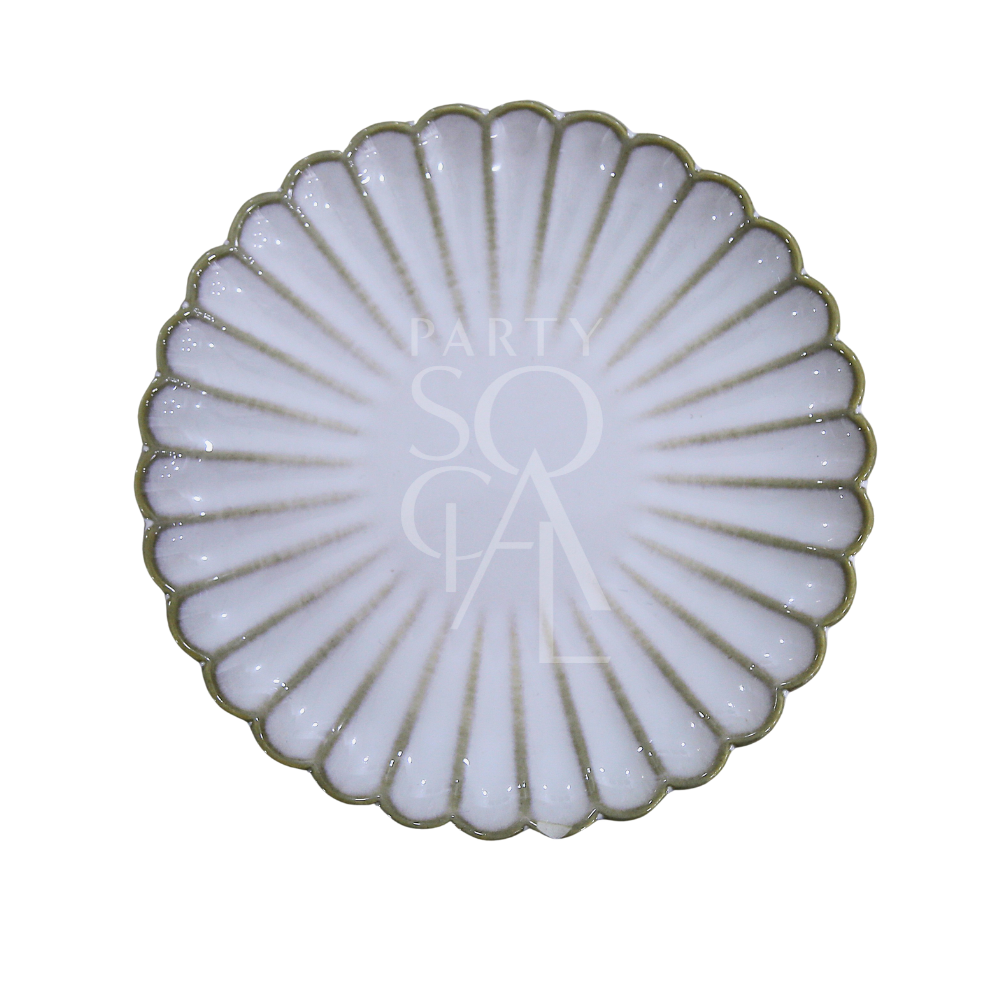 SCALLOPED LIKE PLATES: White ceramic plate with scalloped edges and gold rim, featuring a shell-like design with fluted segments, ideal for elegant dining settings.