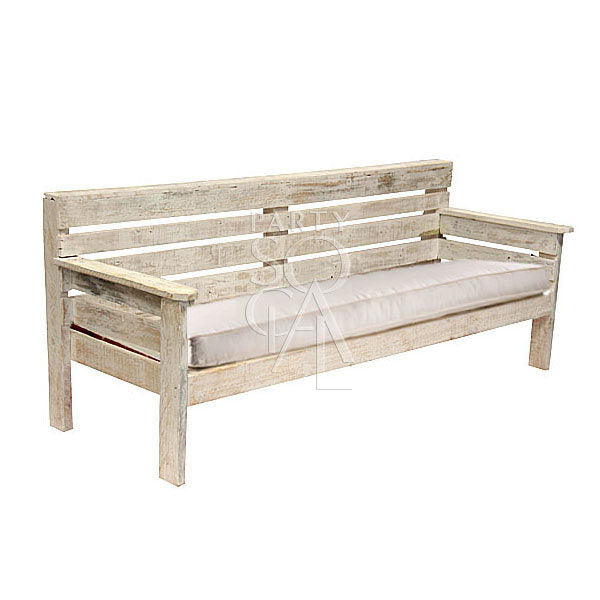 WHITE WOOD 4 SEATER LOUNGE, a rustic white wooden bench with a dark sand cushion, ideal for event seating from Party Social&