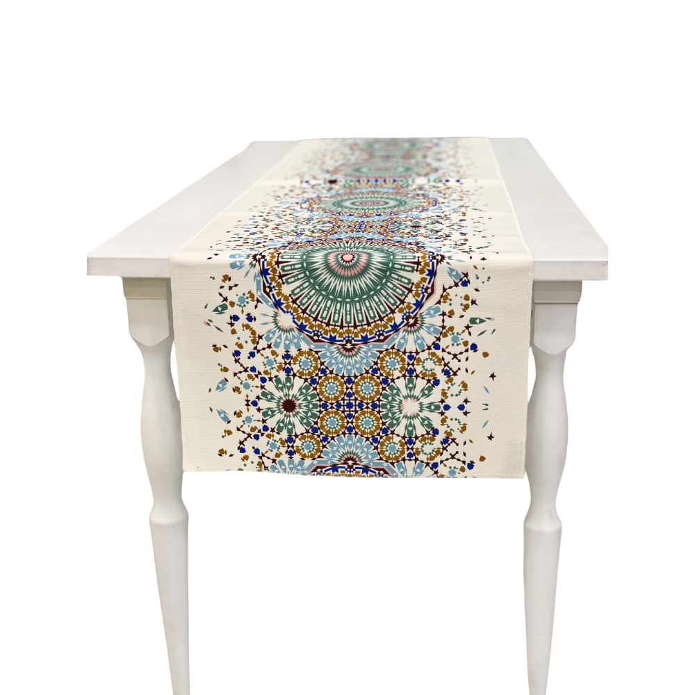 Arabesque Polyester Linen Runner on a white table, featuring mosaic-style medallions and starburst patterns, ideal for enhancing elegant table setups at special occasions.