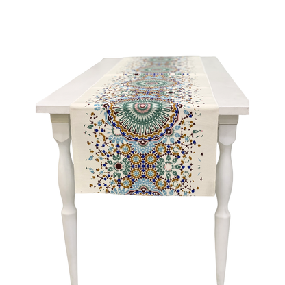 Arabesque Polyester Linen Runner on a white table, featuring mosaic-style medallions and starburst patterns, ideal for enhancing elegant table setups at special occasions.