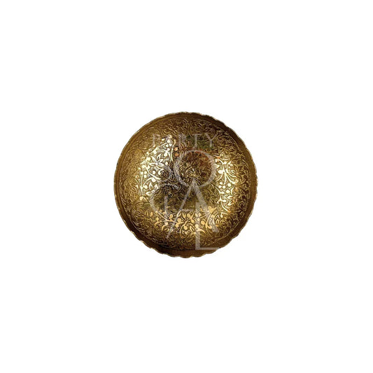 Arabic Table Accessory featuring a gold circular plate with intricate floral designs, ideal for enhancing table setups with an authentic Arabic touch.