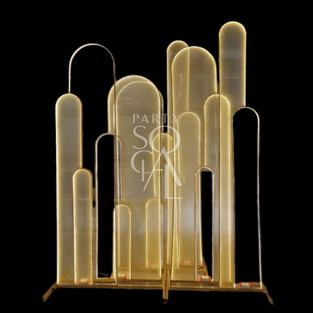 LED ARCH gold asymmetrical sculpture, ideal for bridal stages, koshas, or event backdrops, featuring LED lighting. Suitable for weddings, baby showers, and parties.