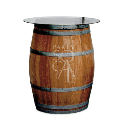 Rustic wine barrel table 225ltr with glass top, featuring metal rings, ideal for creating authentic event cocktail or bar areas.