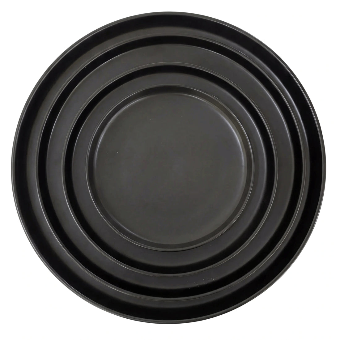 Black Ceramic Collection: A set of nested black metal baking trays in graduated sizes, perfect for enhancing elegant table settings at any event.