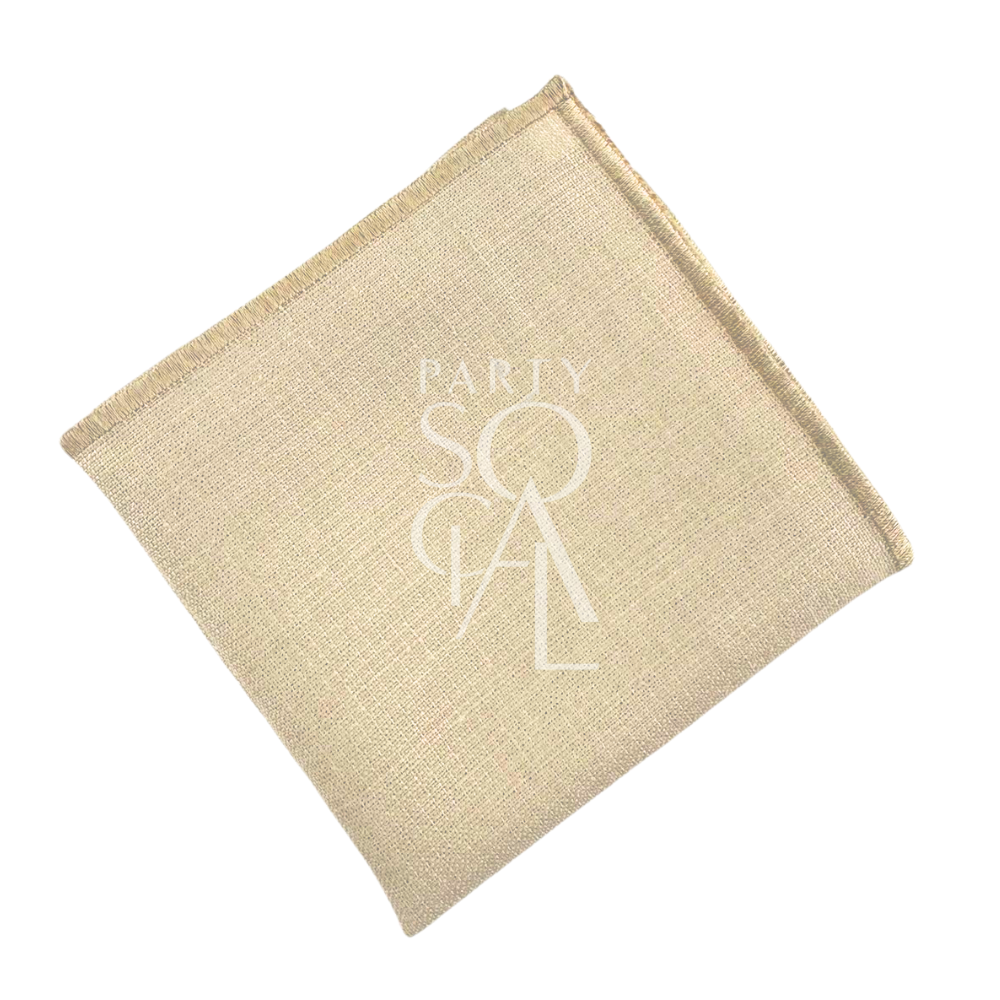 NAPKIN BLEACHED SAND W/ LINE featuring a stitched logo on beige linen blend, ideal for events. Enhance any table setting with this elegant napkin.