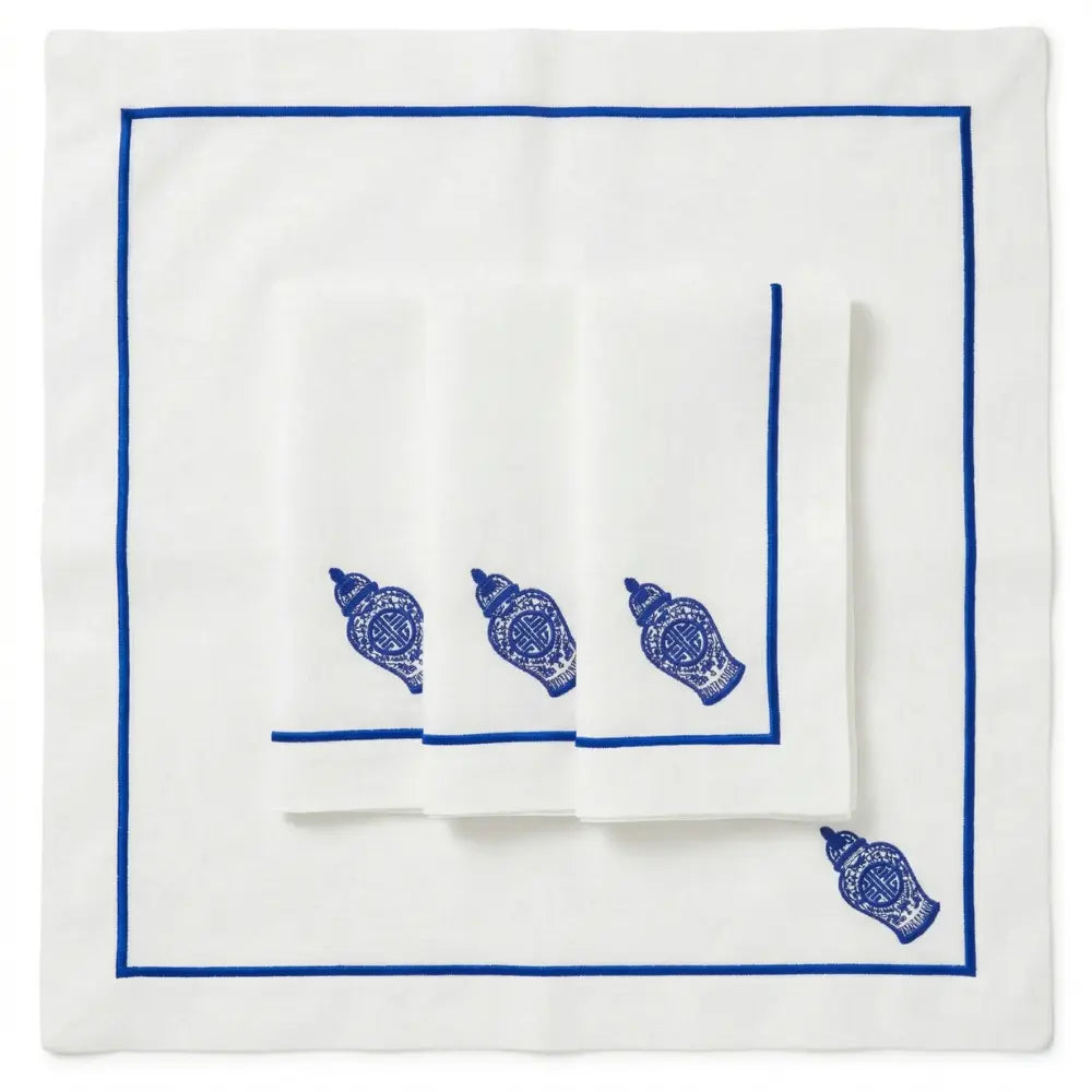 Blue Chinoiserie Pure Linen Dinner Napkin set features elegant napkins with a royal-blue border and ginger jar motif, perfect for sophisticated table settings.
