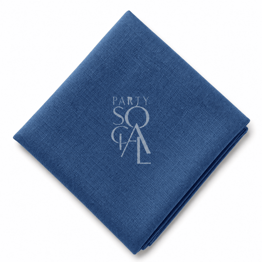 A square Blue linen napkin displayed diagonally on a clean white background.
