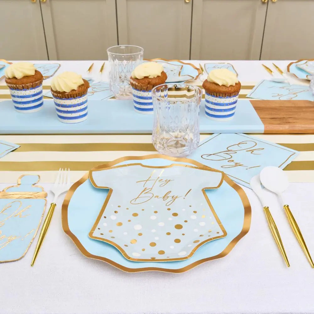 Table featuring Everyday Sky Blue Guest Towel Napkins amidst a baby shower setup with onesie-shaped plates and gold-handled cutlery, embodying Party Social&