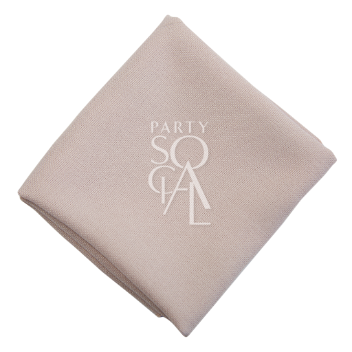 NAPKIN COTTON LINEN folded with a stitched logo, ideal for elevating any event setup, available for personalization to suit corporate gatherings or special occasions.