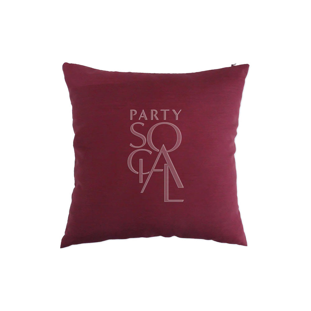 CUSHION COVER SATIN: Red pillow featuring a logo, crafted from premium satin fabric, ideal for enhancing event décor. Available in multiple sizes.