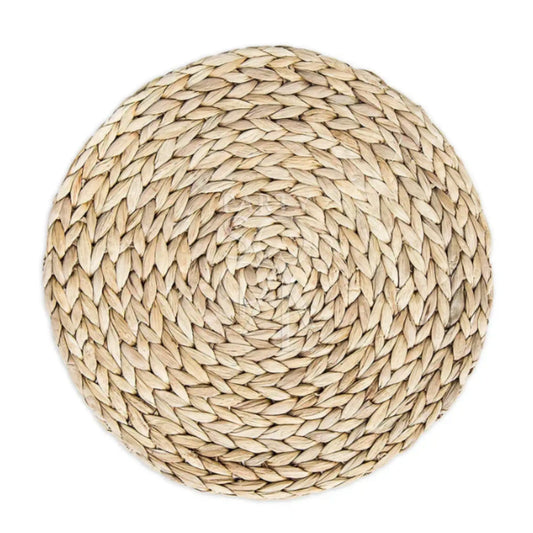 CANE PLACEMAT: Round, braided tabletop mat made from natural fibers, featuring a rustic, concentric weave. Ideal for enhancing any table setting. 38cm diameter.