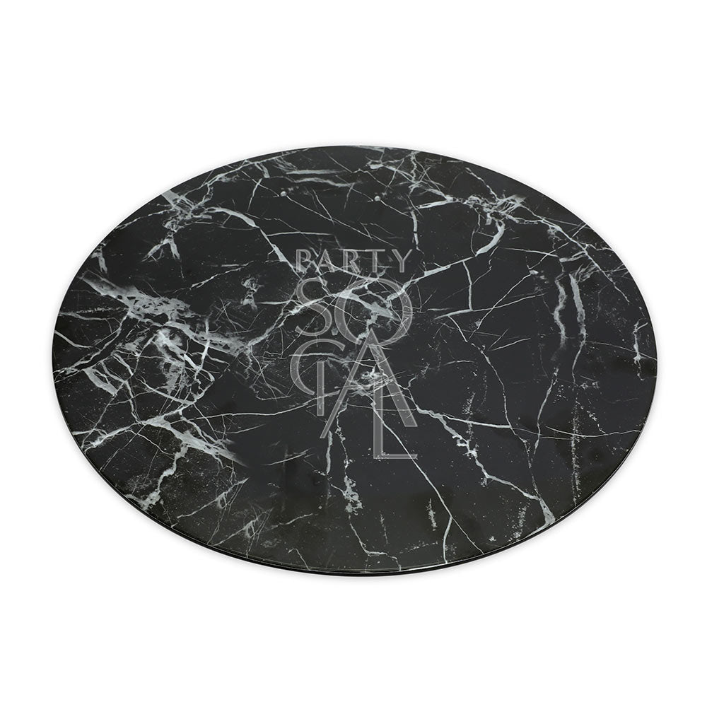 CHARGER PLATE - MARBLE TRAY: A black and white circular marble tabletop, ideal for elegant serving at events, measuring 33cm in diameter.