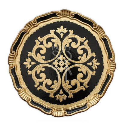 Charger Plate - Florentine Antique: A handcrafted wooden plate with black center, gold scrollwork, and scalloped rim, perfect for elegant table setups.
