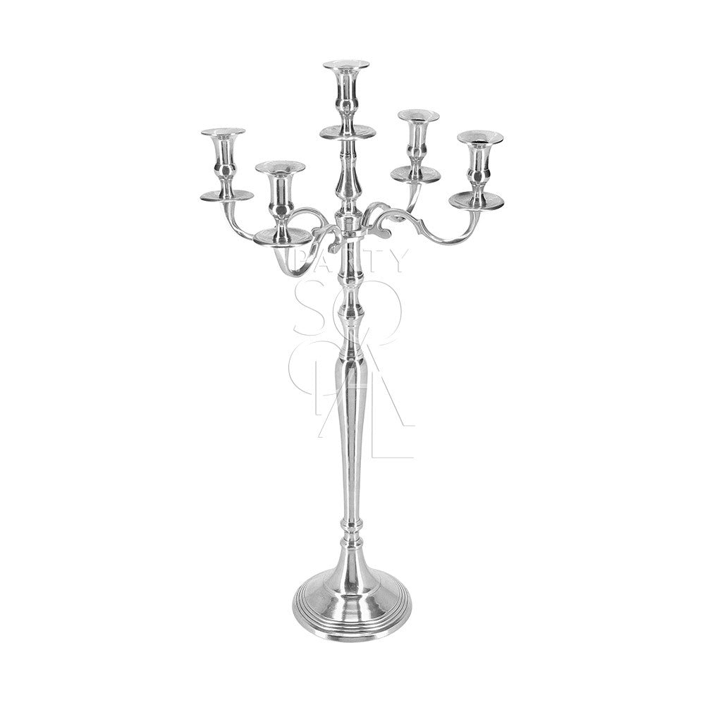 CANDELABRA: A silver candelabra with candles, perfect for adding elegance to tables or consoles, ideal for parties and events. Candles sold separately.