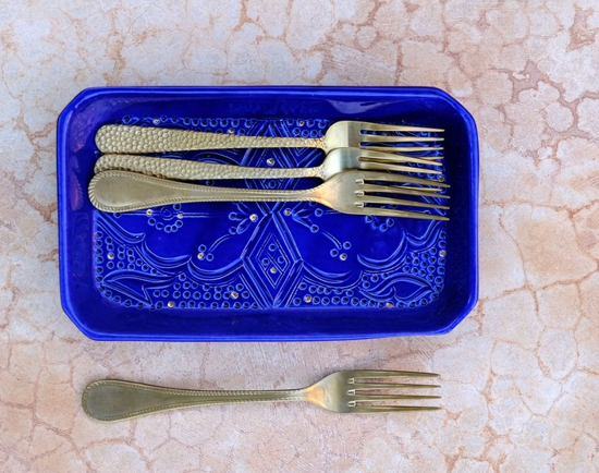 Marrakesh Ceramic Platter with elegant silverware and utensils for stylish dining experience.