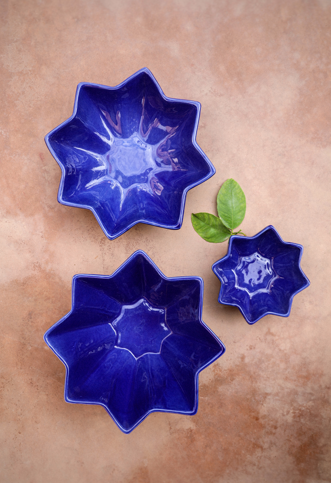 A group of star-shaped ceramic bowls perfect for serving homemade dishes and salads.