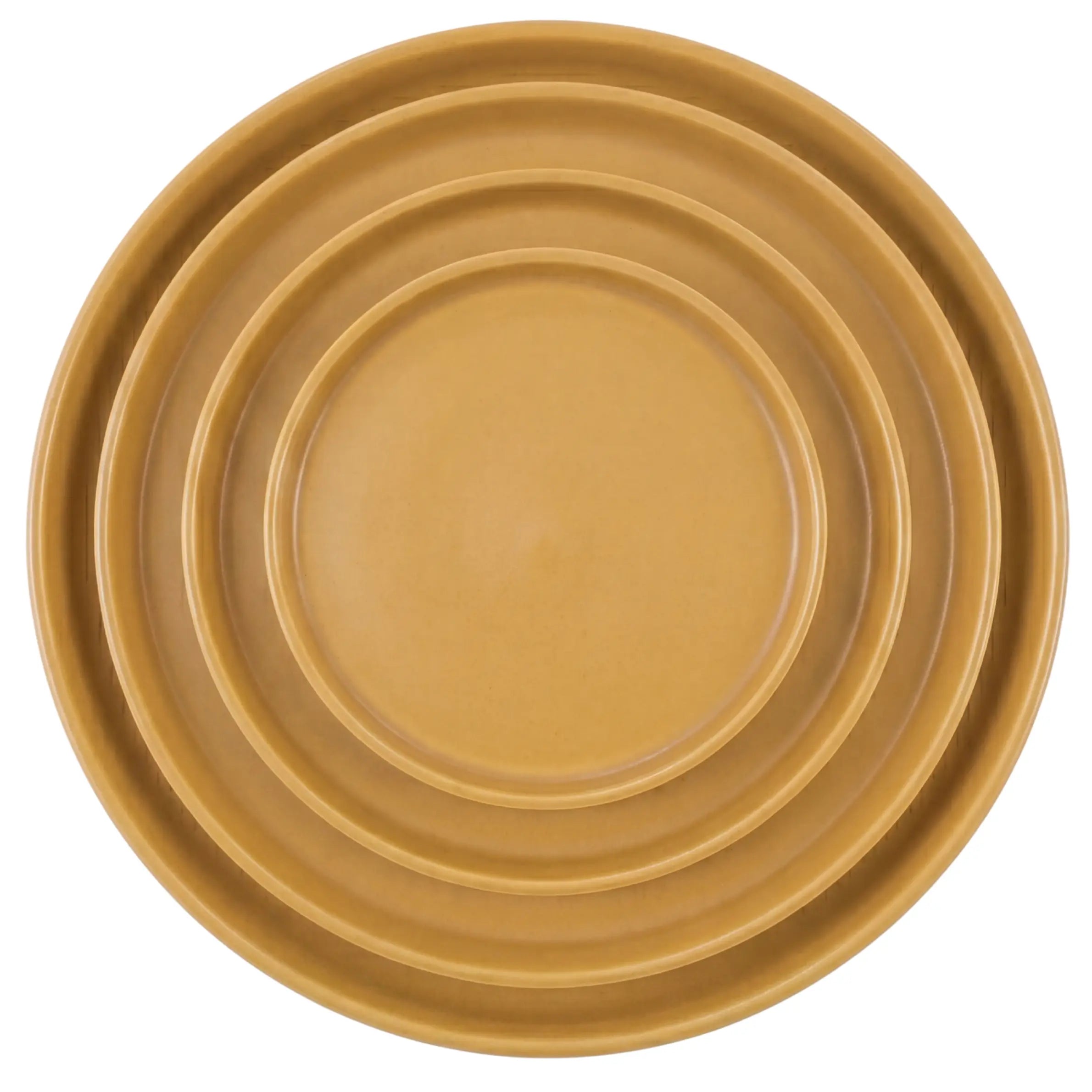 Mustard Ceramic Collection: Nested dinnerware set showcasing modern simplicity, featuring charger, dinner, dessert, and B&amp;B plates with a matte finish for elegant dining.