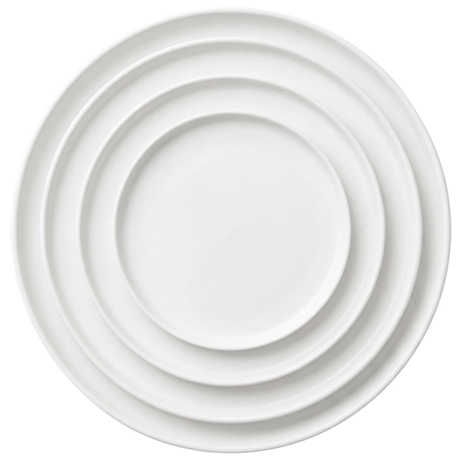 White Ceramic Collection features four nested round ceramic plates, ideal for elevating any table setting, perfect for parties and events.