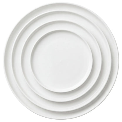 White Ceramic Collection features four nested round ceramic plates, ideal for elevating any table setting, perfect for parties and events.