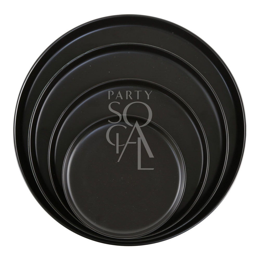 CERAMIC PLATES - BLACK: A stack of elegant black round ceramic plates, perfect for enhancing any party or event setting with a sophisticated touch.