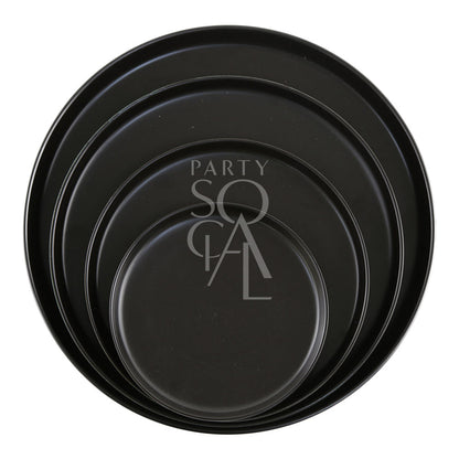 CERAMIC PLATES - BLACK: A stack of elegant black round ceramic plates, perfect for enhancing any party or event setting with a sophisticated touch.