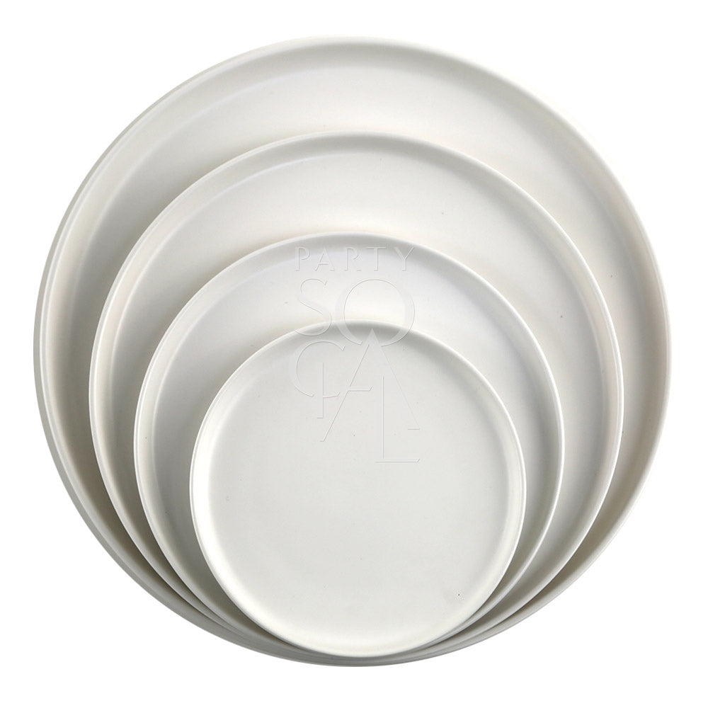 CERAMIC PLATES - WHITE: A stack of white ceramic plates, suitable for elegant dining settings. Available in various sizes for versatile table arrangements.