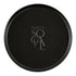 CERAMIC PLATES - BLACK: A sleek black round ceramic plate featuring a subtle logo, ideal for enhancing elegant table settings at events.