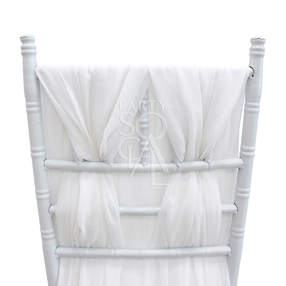 White chiffon train chair cover for Chiavari chair, showcasing an elegant and whimsical design, perfect for enhancing event decor.