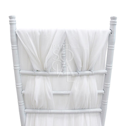 White chiffon train chair cover for Chiavari chair, showcasing an elegant and whimsical design, perfect for enhancing event decor.