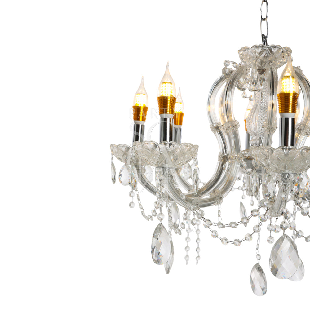 CRYSTAL CHANDELIER: Elegant light fixture with intricate glass details, perfect for adding a glamorous touch to any event setting.