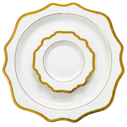 White Lotus Collection: Set of three nested, scallop-edged porcelain plates with gold-trimmed rims, ideal for elegant dining settings.