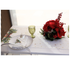 Winter Vine Linen Runner graces a festive table setting with gold snowflakes and holly motifs, complemented by elegant dinnerware and a holiday floral centerpiece.
