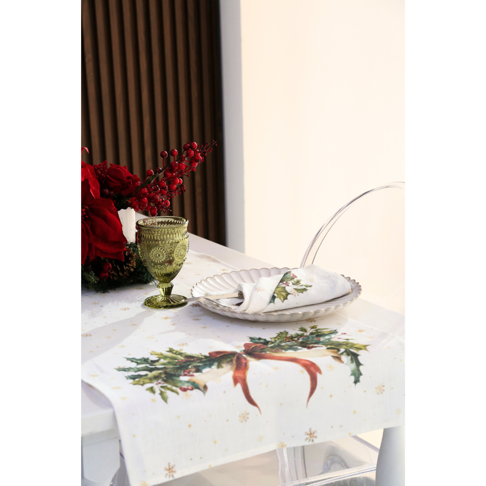 Winter Vine Linen Runner on festive table with holly design, scalloped china plate, vintage glass goblet, poinsettia centerpiece, and acrylic chair, perfect for holiday dining.